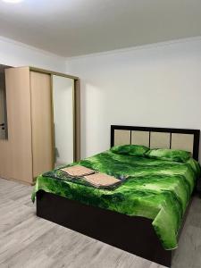 Postel nebo postele na pokoji v ubytování Apartament27