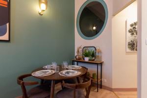Reštaurácia alebo iné gastronomické zariadenie v ubytovaní appartement cosy en plein coeur de dijon