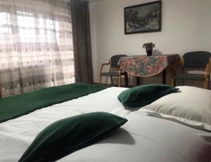 Ein Bett oder Betten in einem Zimmer der Unterkunft Apartament Sarco