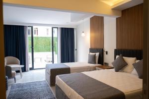 Giường trong phòng chung tại HOTEL DESTİLL