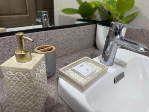 Ένα μπάνιο στο Twinlakes Merlot Vineyard Residences LL3G