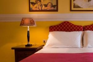 Posteľ alebo postele v izbe v ubytovaní B&B Old Florence Inn