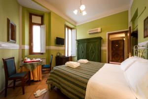 Posteľ alebo postele v izbe v ubytovaní B&B Old Florence Inn