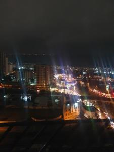 a view of a city at night with lights at Lucky home in Nizhnyaya Alekseyevka