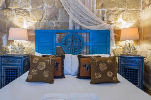 Postel nebo postele na pokoji v ubytování Chapel 5 Boutique Suites B&B