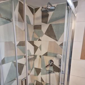 A bathroom at Alexandra's Cozy Sea View Apartment