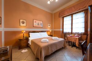 Posteľ alebo postele v izbe v ubytovaní B&B Old Florence Inn