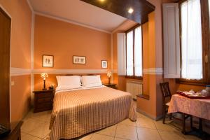 Posteľ alebo postele v izbe v ubytovaní B&B Old Florence Inn