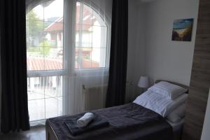 Posteľ alebo postele v izbe v ubytovaní Főnix Design Rooms