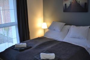 Posteľ alebo postele v izbe v ubytovaní Főnix Design Rooms