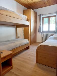 Giường trong phòng chung tại Chalet Relax +32 ảnh