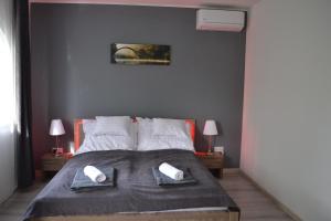 Posteľ alebo postele v izbe v ubytovaní Főnix Design Rooms
