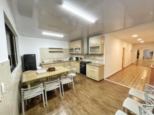 A cozinha ou cozinha compacta de Puesta del Sol Guest House
