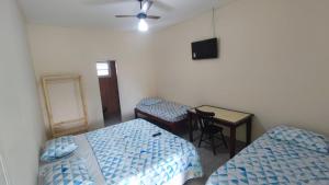 Katil atau katil-katil dalam bilik di Pousada Green Ville 13-99651-1561