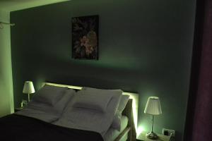 Posteľ alebo postele v izbe v ubytovaní Főnix Design Rooms