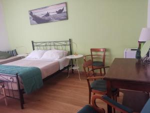 Posteľ alebo postele v izbe v ubytovaní Home 103