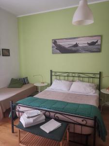 Posteľ alebo postele v izbe v ubytovaní Home 103