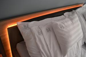 Posteľ alebo postele v izbe v ubytovaní Főnix Design Rooms