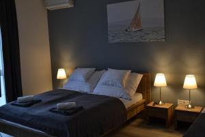 Posteľ alebo postele v izbe v ubytovaní Főnix Design Rooms