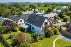 an aerial view of a house with a yard at Croft Farm & Celtic Cottages in Cardigan