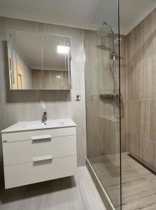 Koupelna v ubytování Harmonie Apartments + 9 fotografií