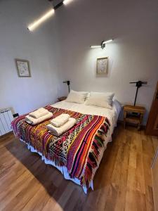 Una cama o camas en una habitación de Frontera Andina
