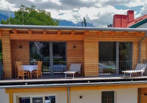 A balcony or terrace at Seespitz 37 - Ferienwohnungen Eisendle