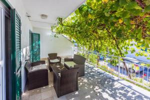 Posedenie v ubytovaní Apartments Opacak Selce