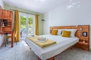 Posteľ alebo postele v izbe v ubytovaní Apartments Opacak Selce