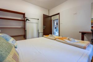 Posteľ alebo postele v izbe v ubytovaní Apartments Opacak Selce