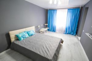 Cama o camas de una habitación en Kultury Street Apartment