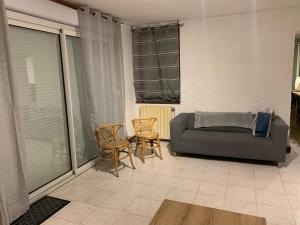 Część wypoczynkowa w obiekcie Le Gîte de Félix - Maison chaleureuse 190m2 - 6 ch - 20pers