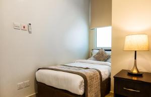 Indium Villas Durrat Al Arus for families only客房内的一张或多张床位