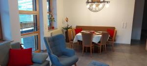 a dining room with a table and chairs at Apartment Tamara's in Heiligen Gestade