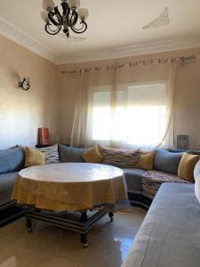 Posezení v ubytování Super appartement avec parking gratuit