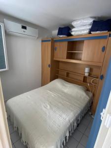 Posteľ alebo postele v izbe v ubytovaní Appartement port argeles