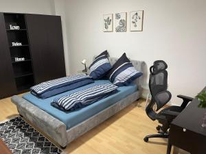 Ένα ή περισσότερα κρεβάτια σε δωμάτιο στο Appartement La Vie en Rose +7 φωτογραφίες
