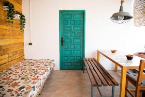 A bed or beds in a room at BONITA CASA CUEVA CON JACUZZI