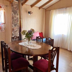 Khu vực ghế ngồi tại Cabañas y Hospedaje Parque los Volcanes