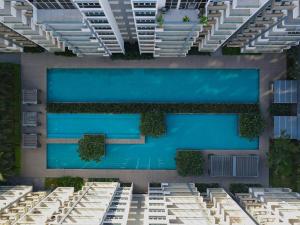 a rendering of a building with a swimming pool at 85 SOHO Hotel & Apartment in Phnom Penh
