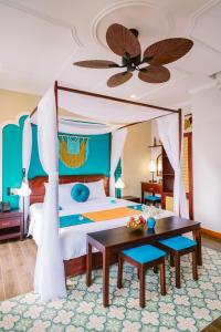 Posezení v ubytování De'Colore Villa Hoi An