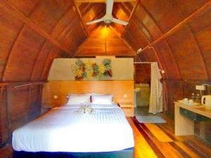 Llit o llits en una habitació de Ovai Hidden Paradise Resort