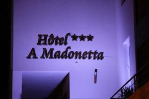 Certifikát, hodnocení, plakát nebo jiný dokument vystavený v ubytování Hôtel A Madonetta