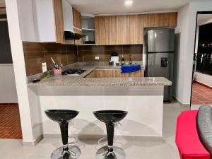Cucina o angolo cottura di Travelu Guatape Apartamento