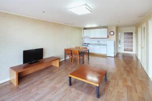 TV a/nebo společenská místnost v ubytování Hanwha Resort Gyeongju