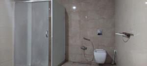 a bathroom with a shower and a toilet at CHEMPION HOSTEL BAKU in Baku