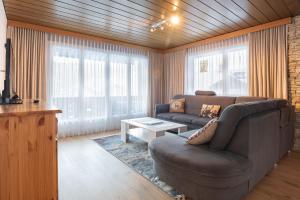 Posezení v ubytování Apartment Jungfrau Lodge