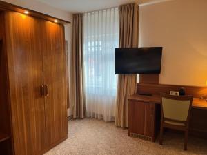 TV/Unterhaltungsangebot in der Unterkunft Boardinghouse am Wall