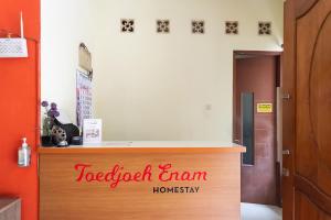 Лобі або стійка реєстрації в Toedjoeh Enam Homestay Syariah