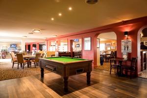 a living room with a pool table in it at Oyster Etchingham SEAVIEW in Whitstable